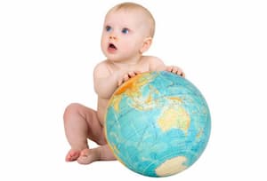 IVF Mexico Baby holding a globe